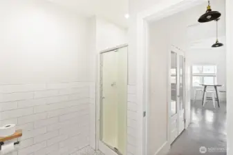 Spacious bathroom could easily be converted for commercial usage or to enlarge the shower