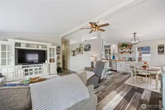 Hallway accesses the main bath & bedrooms to the left.