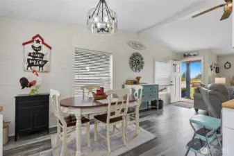 Looking back toward the front entry, eat in space for the large & open kitchen.