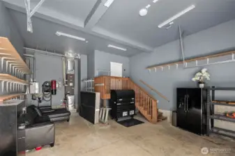 Spacious 2 car garage w/shelving