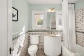 Upper-level guest bathroom combines classic charm with practical, functional appeal.