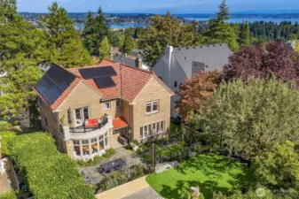 This home features a 2-car garage with EV charging, expansive indoor-outdoor living, and timeless character, all while maintaining modern functionality and energy efficiency.