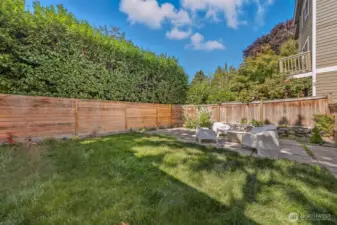 Brand new landscaping in the fully fenced backyard.