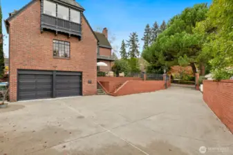 Large private gated drive and 2 car garage