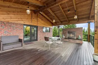 Enjoy BBQing year-round with covered deck and fireplace