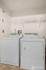 Washer and dryer is next to the new hot water tank