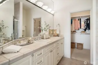 The walk through bathroom will lead you into the walk-in closet.