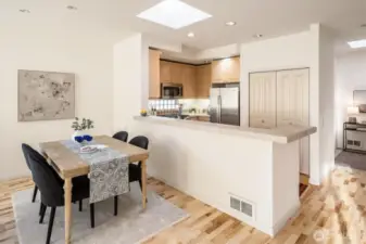 The open layout of Dining Room to Kitchen makes entertaining a snap.