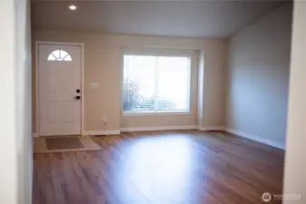 Living Room with lots of natural light and new LVP flooring