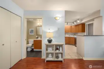 Side closet near powder room offering additional storage.