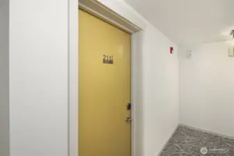 Entrance to unit on second floor of building.