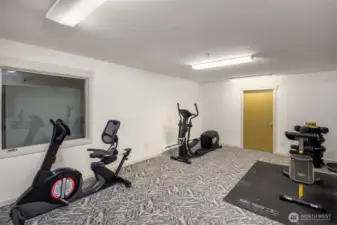 Building amenities, featuring gym on same floor as unit.