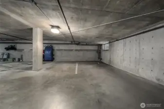 Assigned parking space in attached parking garage.