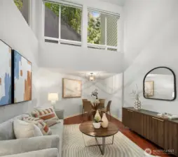 High ceilings in living room amplifying the ambiance and making the space live large.