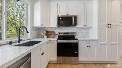 Photos for reference.  Same floorplan, similar features. Kitchen has lots of cabinet space.