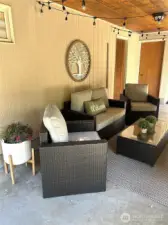 Covered Patio under deck with a fireplace!