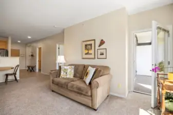 Light and bright living room w/ access to the balcony