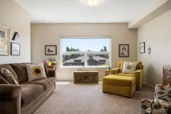 Light and bright living room w/ access to the balcony on the left