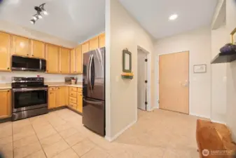 Looking towards front door and den on the left.