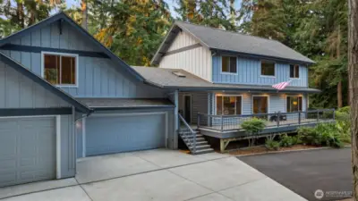 4 Car garage with unfinished bonus room above.