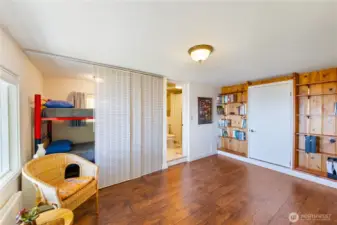 The bunkroom. Entry to the outside is to the left. The double-bunks have sliding privacy screens.