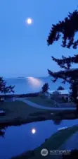 And you thought the sunsets were great. Moon rising over the sound and lake. Photo taken from the house by the current owners.