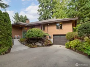The long driveway leads right to the garage.