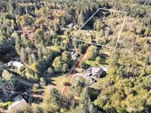 Property lines are approximate. You can see in this picture how the shared driveway works...