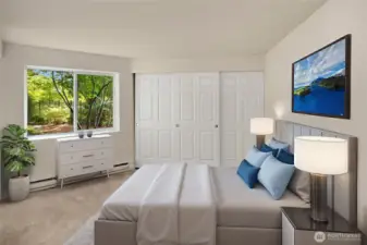 Spacious primary has 2 closets.