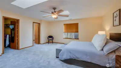 Step into the primary bedroom with direct access to a large walk-in closet and en suite bathroom, offering ultimate comfort and privacy