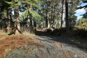 Salmonberry Rd end has a small pull out for parking, although not an official driveway.