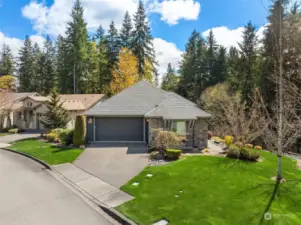 This oversized sunny corner lot is against a beautiful green space for wonderful privacy.