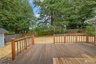 Your back yard oasis starts with a very large cedar deck.