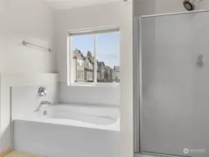 Primary bathroom with separate tub and shower