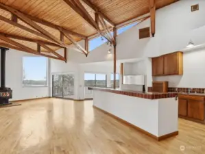 Open living and kitchen area for gatherings and water views