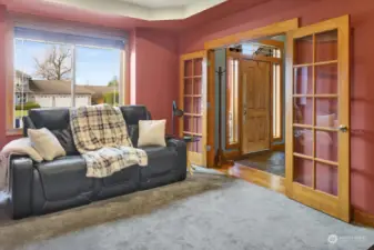 The den includes french doors for privacy.