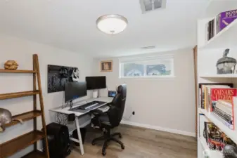 Downstairs room being used as an office.