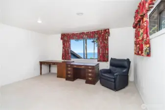 As one of two bedrooms upstairs, this was used as an Office.