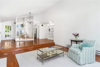 To the right is the entrance to the kitchen and front patio.
