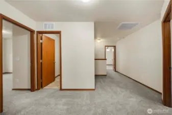 Enjoy added privacy with the primary bedroom situated on one side of the home, while the additional bedrooms are located on the opposite side.