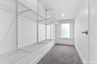 Walk in closet for Primary bedroom, upstairs.