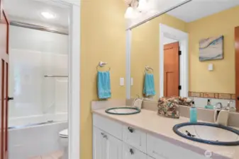 Hall bath with heated floors and double sinks