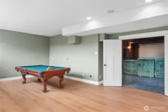 Overhead lighting designed with Billiards in mind. Plumbed for wet bar.