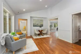 Front room, beautiful area for dining table and sitting area.  High ceilings make it feel spacious and elegant