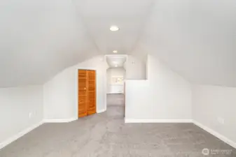 View of the guest bedroom peering into the second guest bedroom.