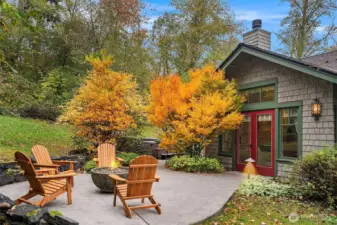 From the den, french doors open to a spacious patio with a gas plumbed fire bowl.