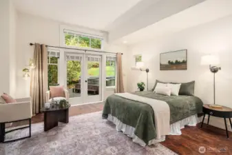 The spacious main level primary bedroom hosts a 3/4 bath, walk in closet, additional closet, and opens to a private patio for quick access to the hot tub and outdoor shower.