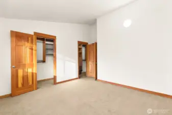 Closets are equipped with high end California Closet inserts.