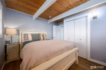 Main level bedroom with tongue & groove ceiling