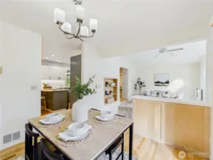 View from the dining area looking down to the Livingroom and the kitchen area.